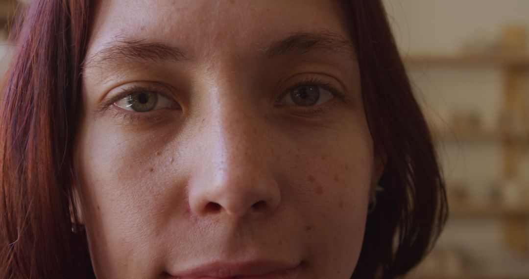 Close-Up of Woman with Freckles and Brown Hair - Free Images, Stock Photos and Pictures on Pikwizard.com