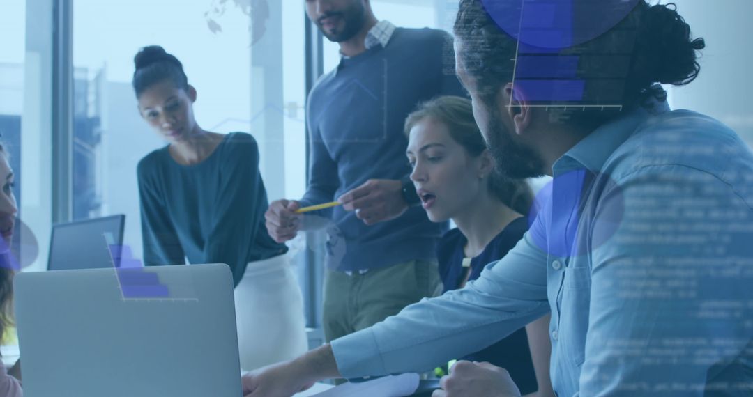 Multicultural Team Collaborating on Technology and Data Analysis