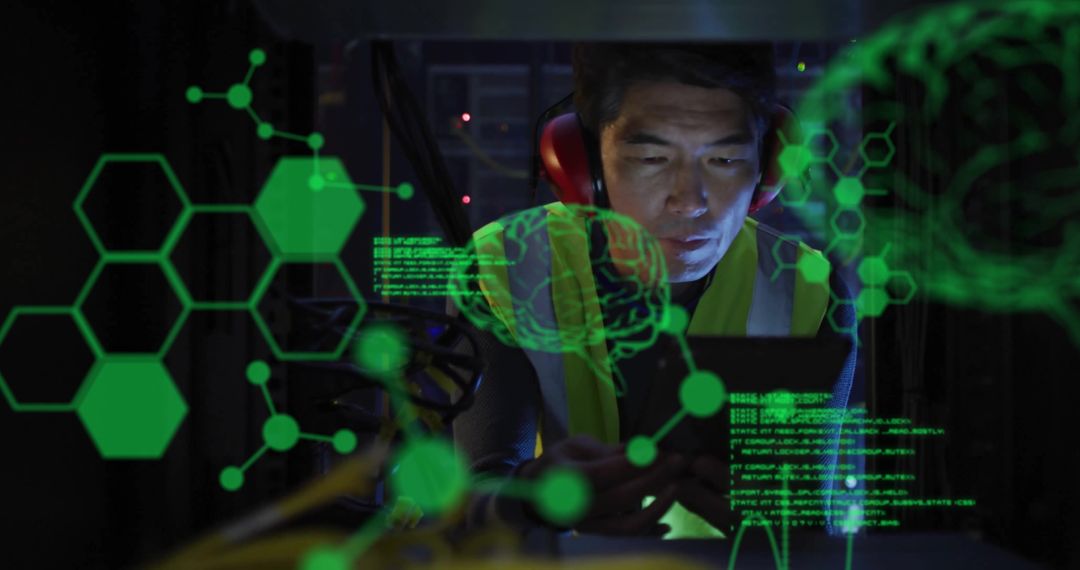 Asian IT Professional Engaged in Data Analysis Within Server Room