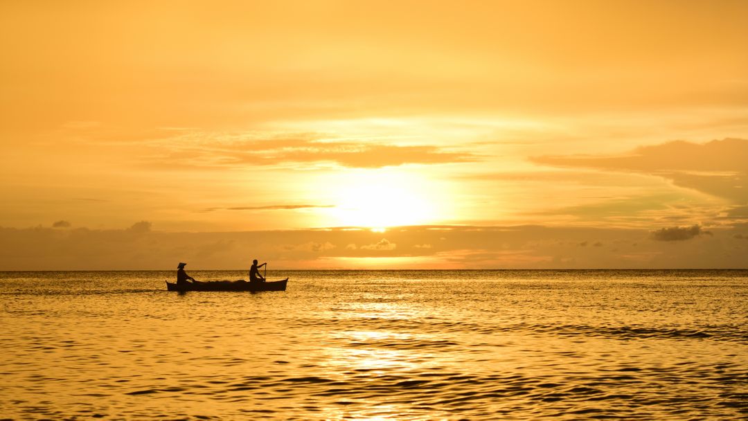 Fishermen Silhouette at Golden Sunset on Tranquil Sea - Free Images, Stock Photos and Pictures on Pikwizard.com