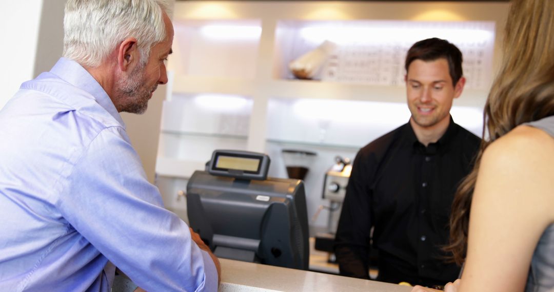 Bartender Engages Customers at Trendy Local Bar Counter