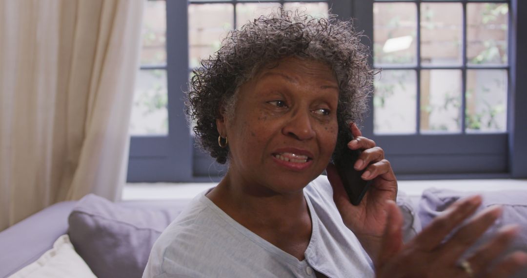 Senior Woman Talking on Smartphone in Cozy Home Office - Free Images, Stock Photos and Pictures on Pikwizard.com