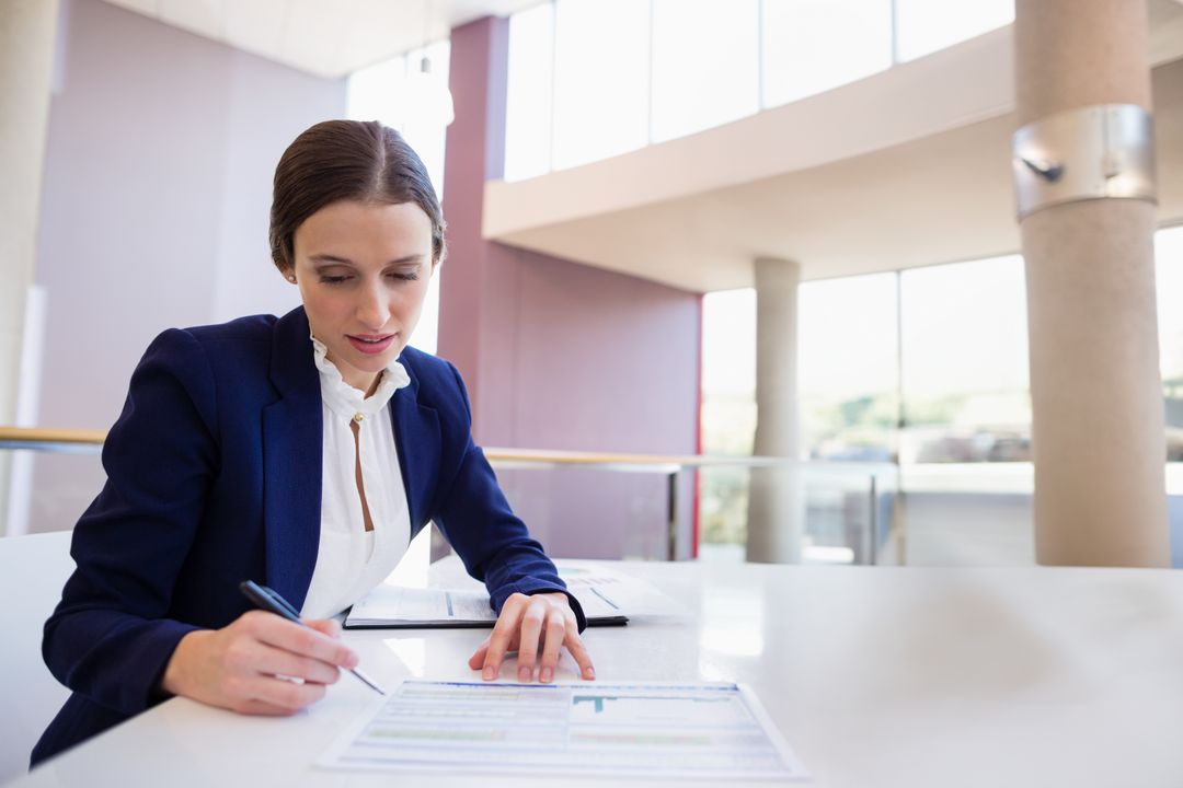 Corporate Professional Analyzing Report in Modern Workspace