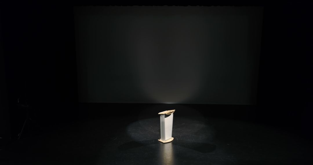 Empty Stage with Podium under Spotlight - Free Images, Stock Photos and Pictures on Pikwizard.com