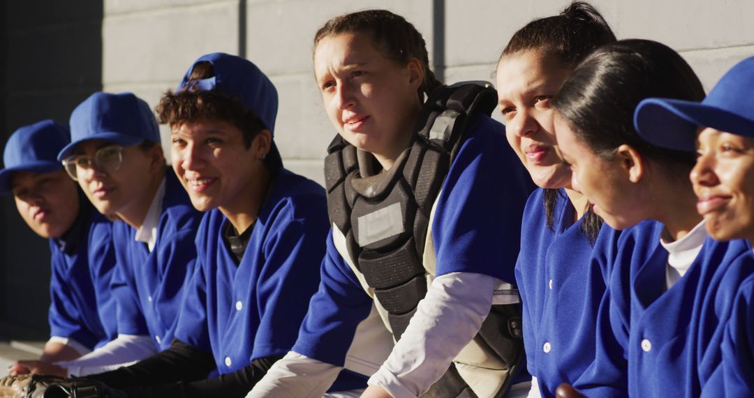 Women's Softball Team Sitting Together in Dugout During Game - Free Images, Stock Photos and Pictures on Pikwizard.com