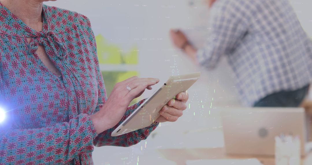 Businesswoman Using Tablet with Digital Overlays