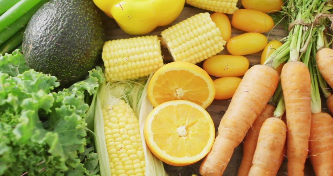 Fresh Organic Produce Display with Kale, Avocado, Corn, and Oranges