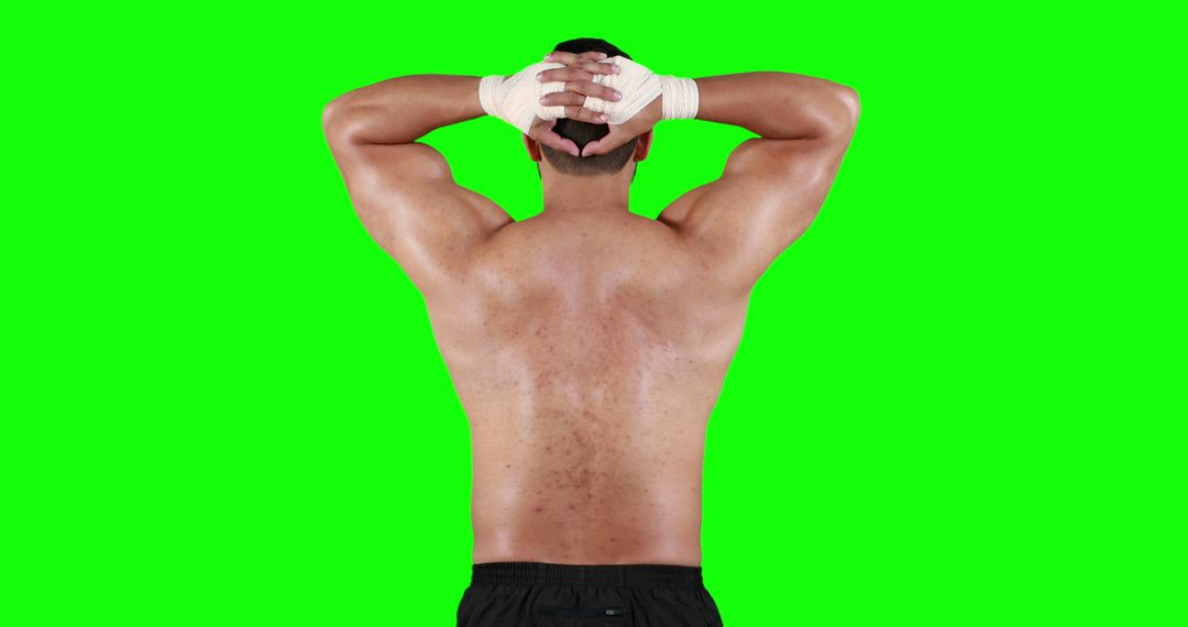 Athletic Man Stretching with Hand Wraps on Green Screen Background - Free Images, Stock Photos and Pictures on Pikwizard.com