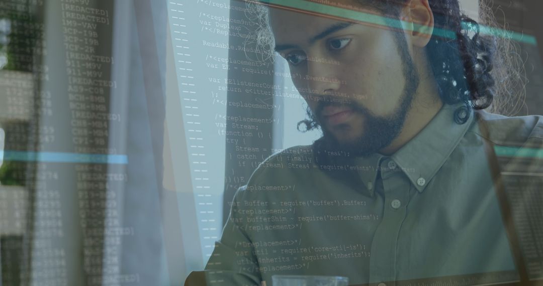 Focused Man with Futuristic Data Overlay Handling Coding