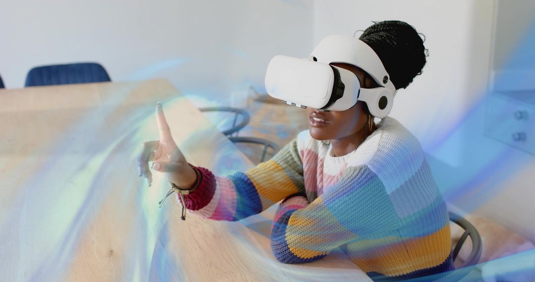 Woman Exploring Virtual World with VR Headset in Modern Office