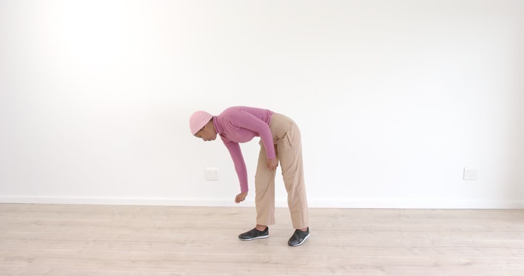 Contemporary Dancer Expressing Artistic Movement in Minimalist Space