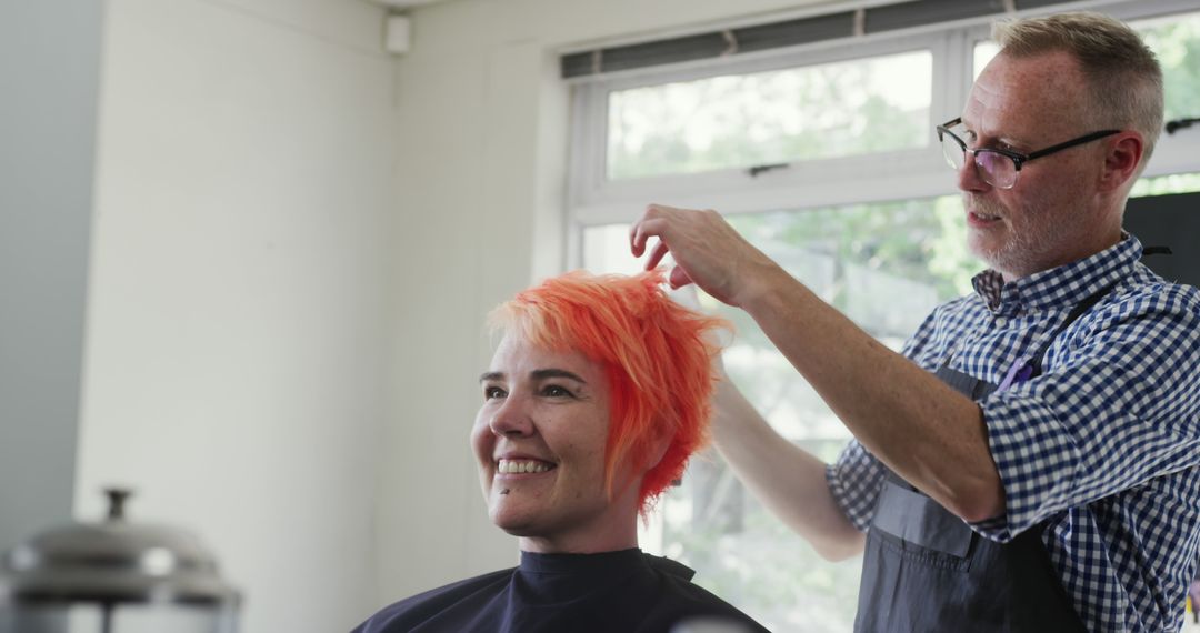 Happy Woman with Vibrant Hair at Salon Getting Haircut by Stylist - Free Images, Stock Photos and Pictures on Pikwizard.com