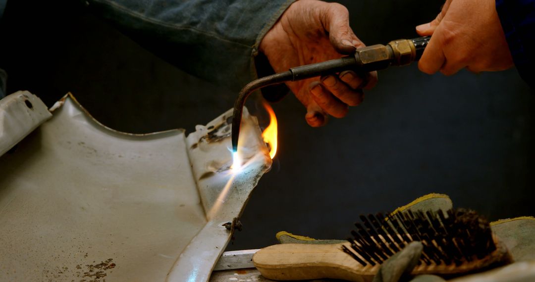 Close-up of Metalworker Using Torch on Metal Sheet - Free Images, Stock Photos and Pictures on Pikwizard.com