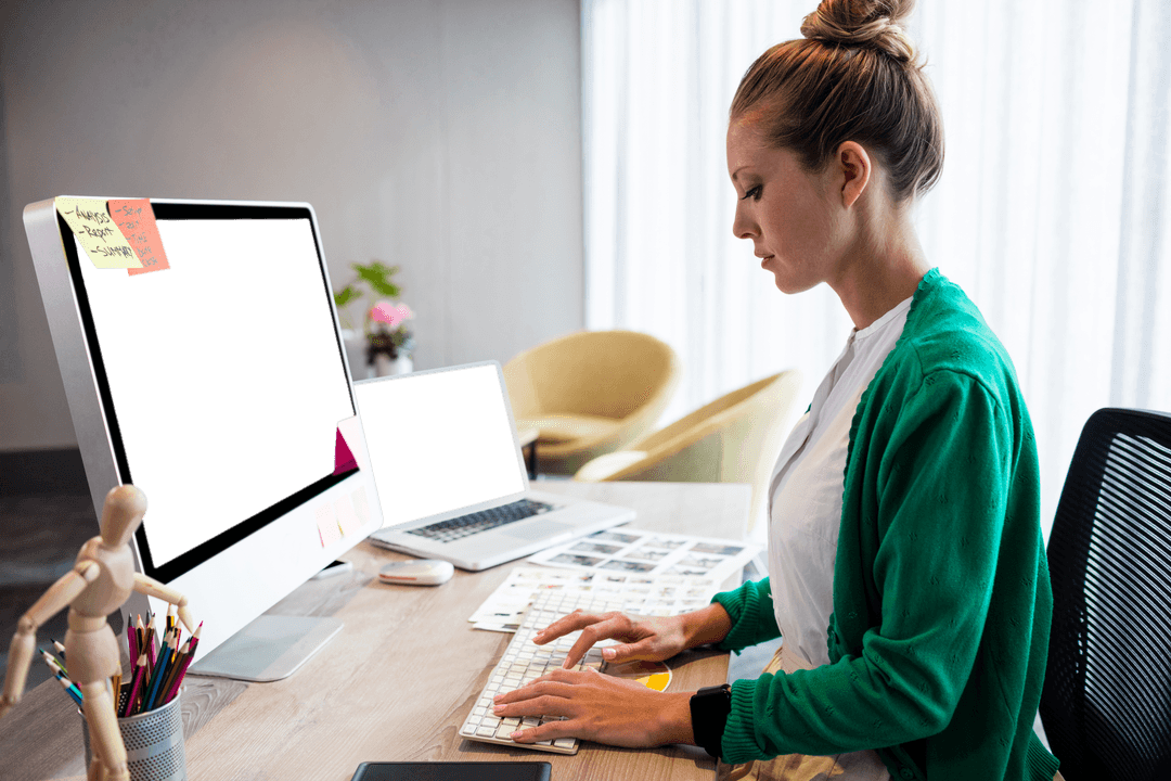 Focused Businesswoman at Transparent Office Desk Setting