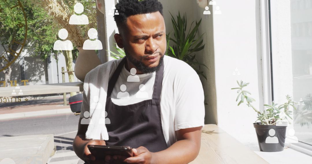 Barista Using Digital Tablet with Professional Networking Overlay