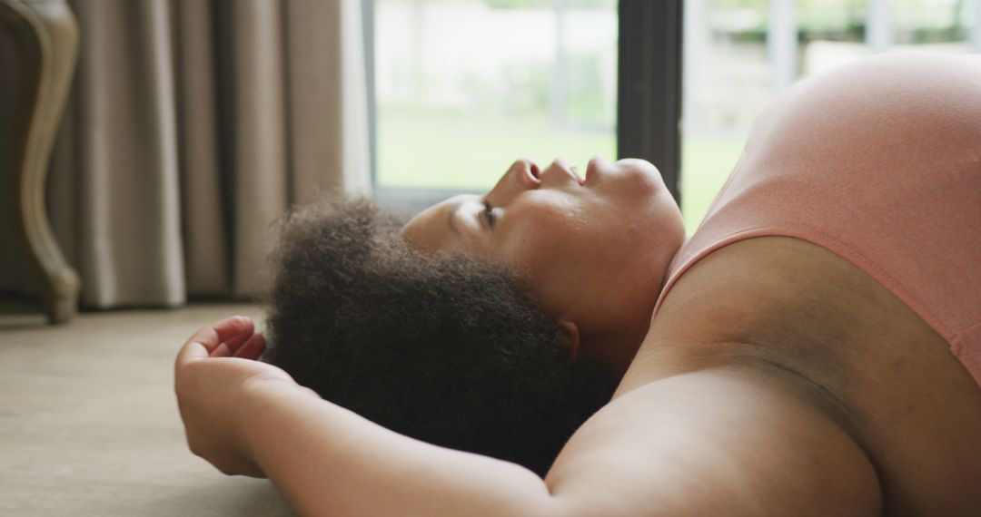 Woman Relaxing on Floor by Window - Free Images, Stock Photos and Pictures on Pikwizard.com