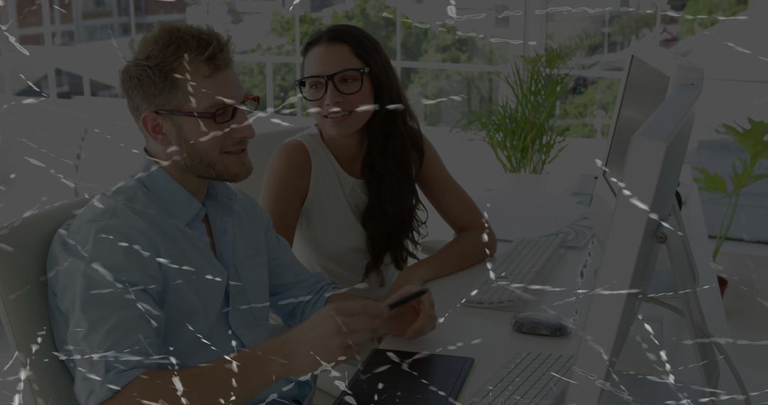 Professional Colleagues Collaborating in Modern High-tech Office