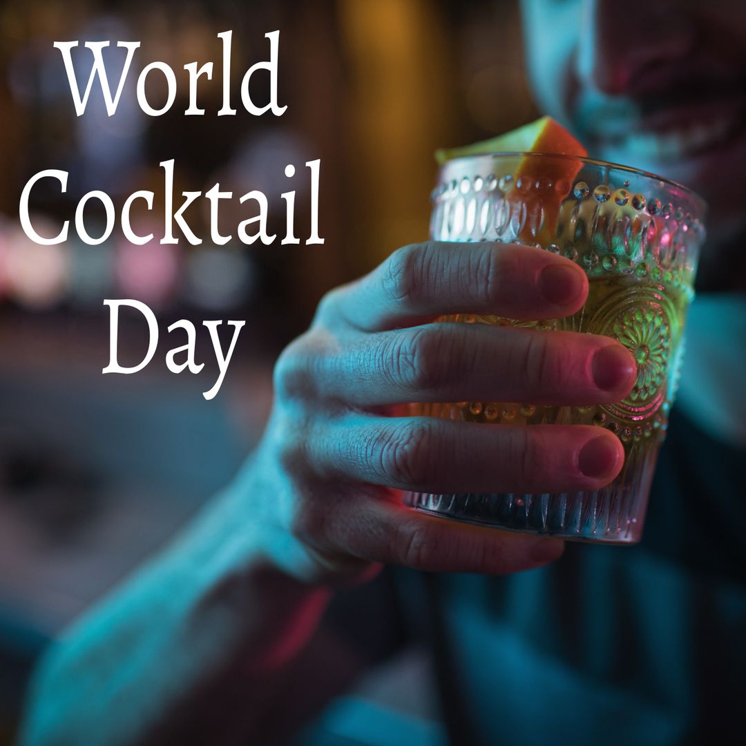 Celebrating World Cocktail Day with Vibrant Drink in Hand