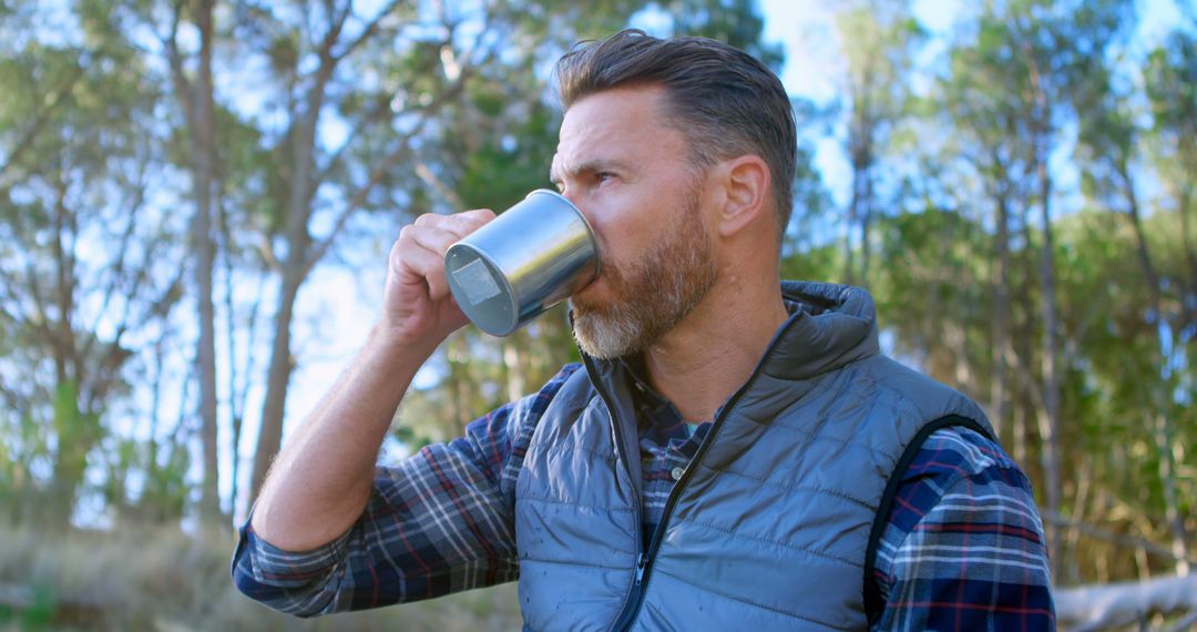 Man Enjoying Coffee Outdoors in Nature - Free Images, Stock Photos and Pictures on Pikwizard.com