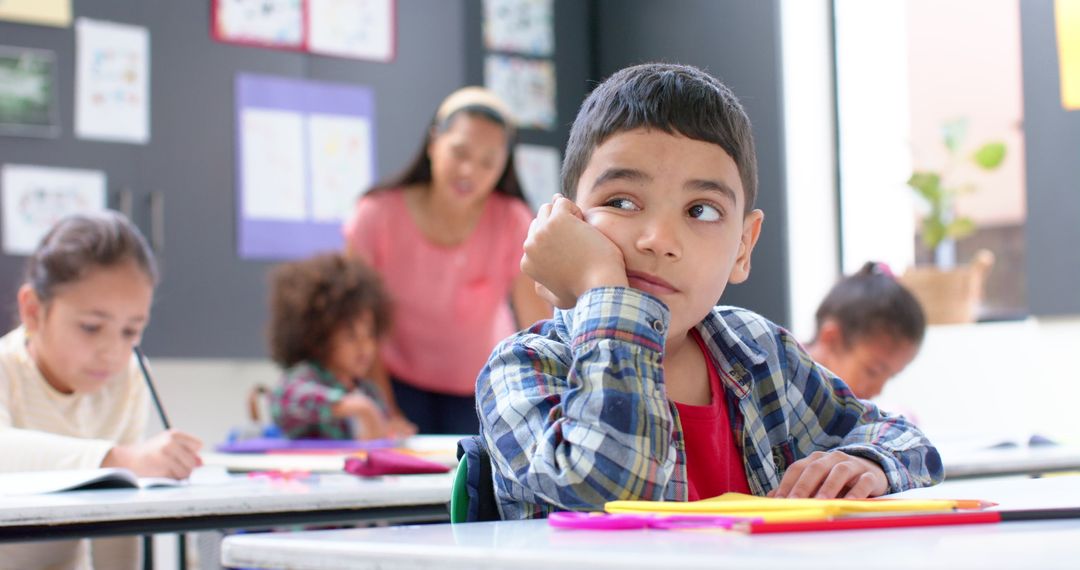 Daydreaming Boy in Diverse Classroom