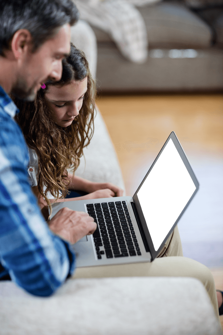Father and Daughter Engaging with Laptop on Translucent Screen