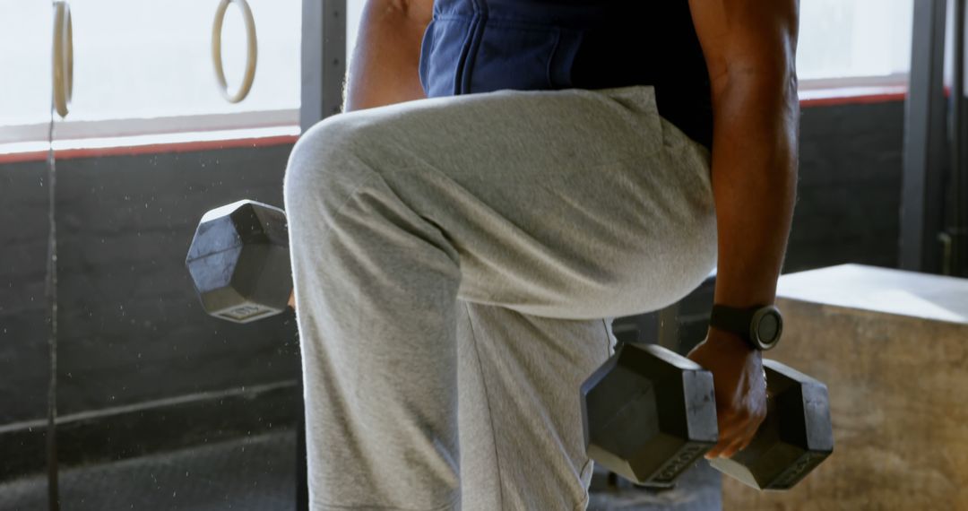 Close-up of Person Lifting Dumbbells in Gym - Free Images, Stock Photos and Pictures on Pikwizard.com