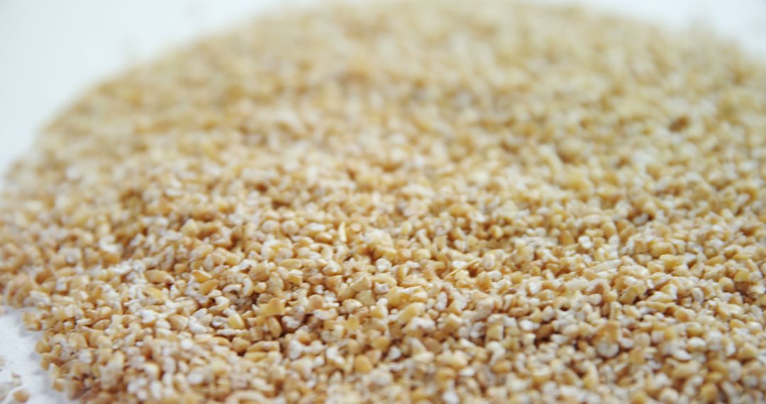 Close-up of Bulgur Wheat Grains on White Background - Free Images, Stock Photos and Pictures on Pikwizard.com