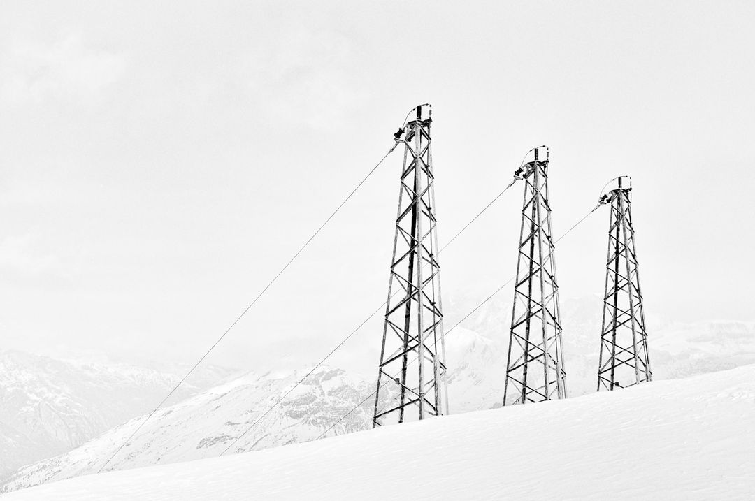 Snowy Landscape with Ski Lift Towers - Free Images, Stock Photos and Pictures on Pikwizard.com