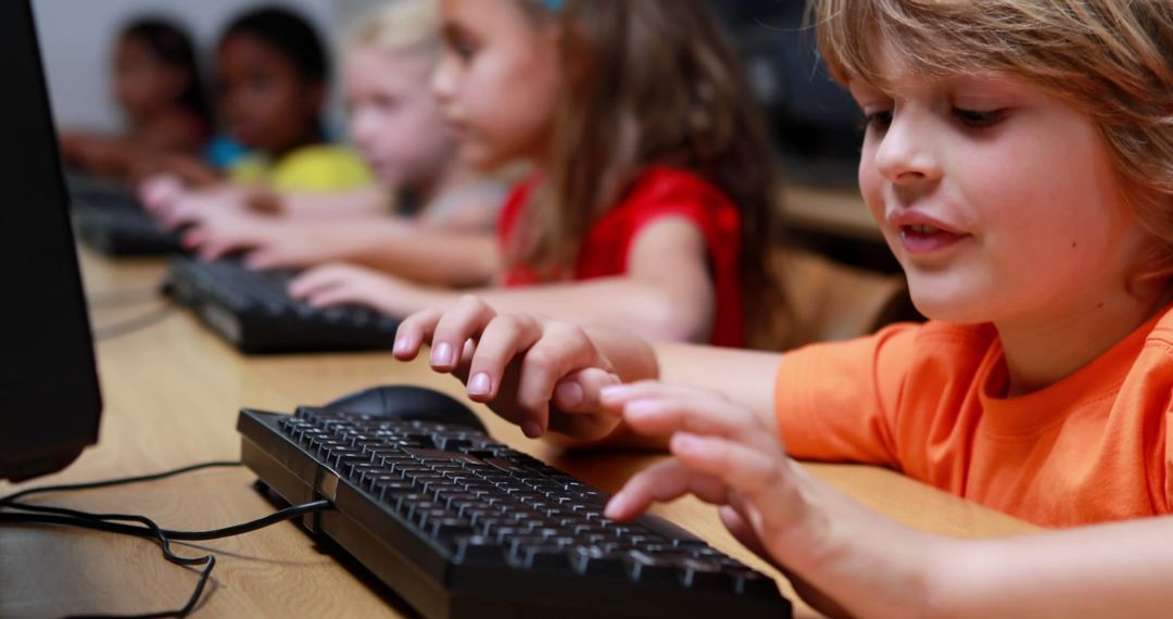 Young Students Engaged in Computer Lab Activities at School