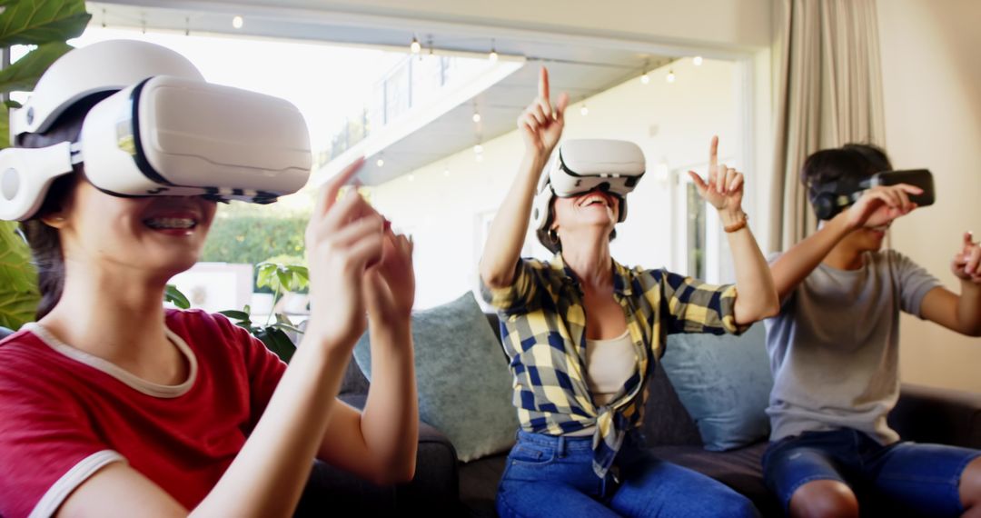 Family Enjoying Virtual Reality Together at Home