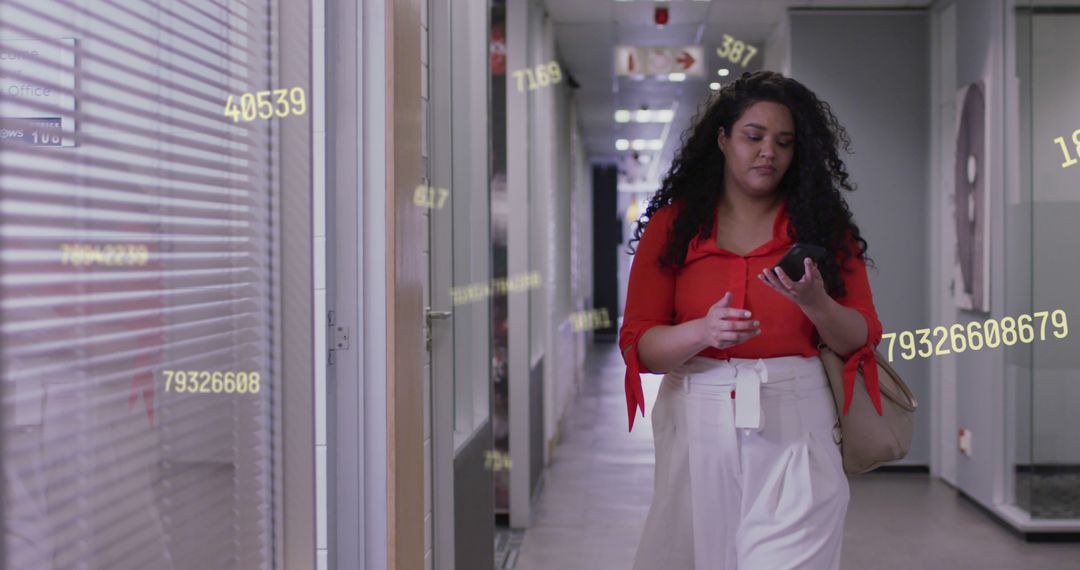 Businesswoman Walking Indoors Using Smartphone with Augmented Reality Data - Free Images, Stock Photos and Pictures on Pikwizard.com