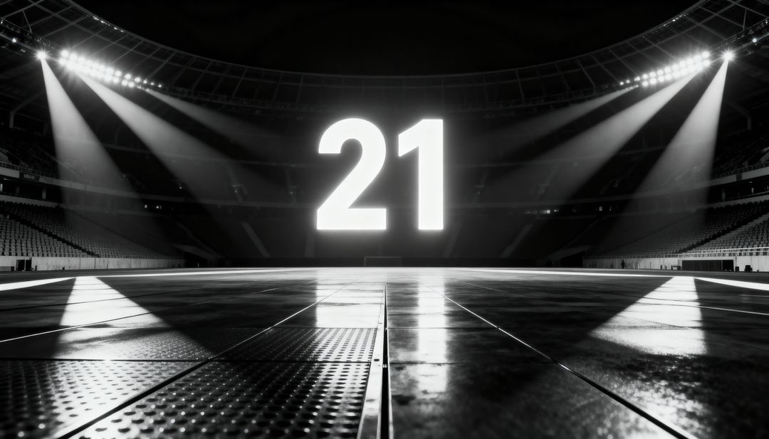 Glowing Numeral 21 Over Empty Arena Floor With Dramatic Spotlights and Symmetry