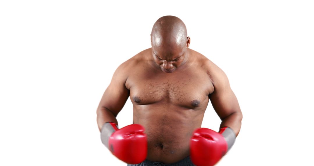 Focused Boxer in Training Gloves Exhibiting Determination