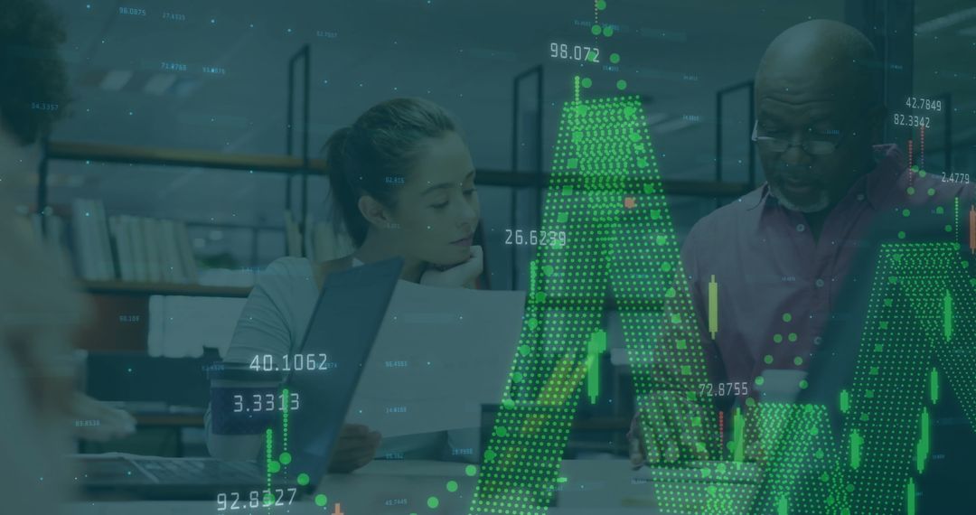 Diverse Team Analyzing Financial Data in Modern Tech Office