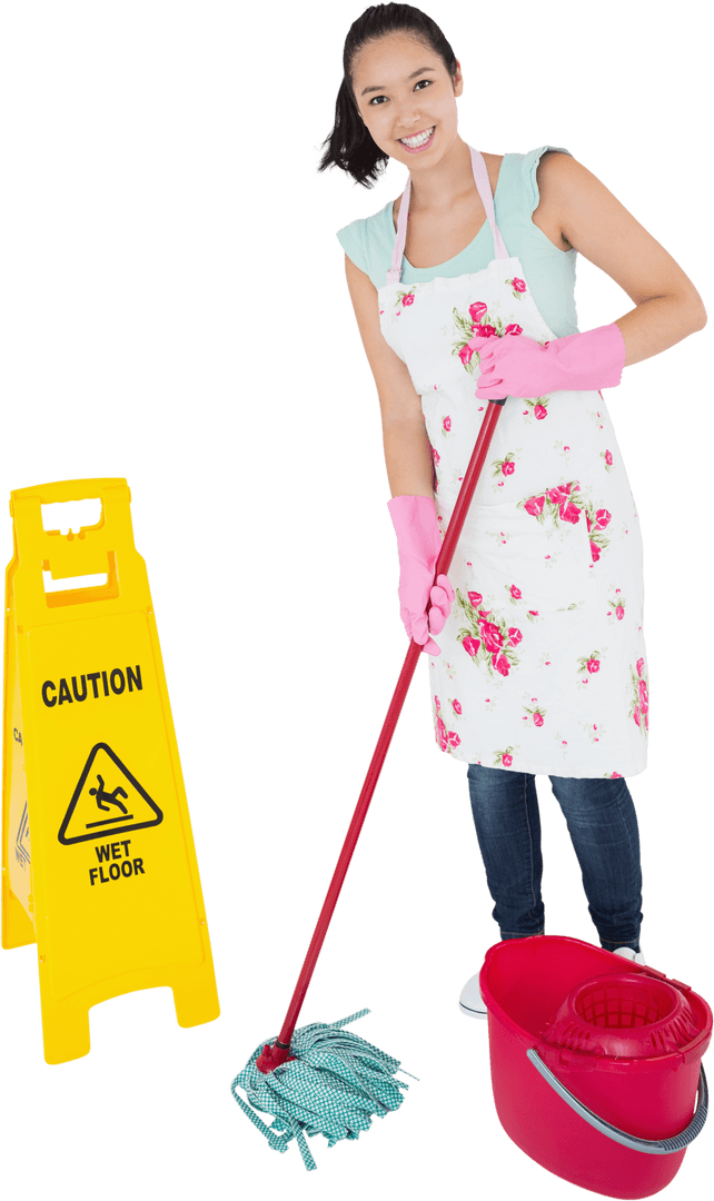 Smiling Woman Mopping Floor with Caution Wet Floor Sign