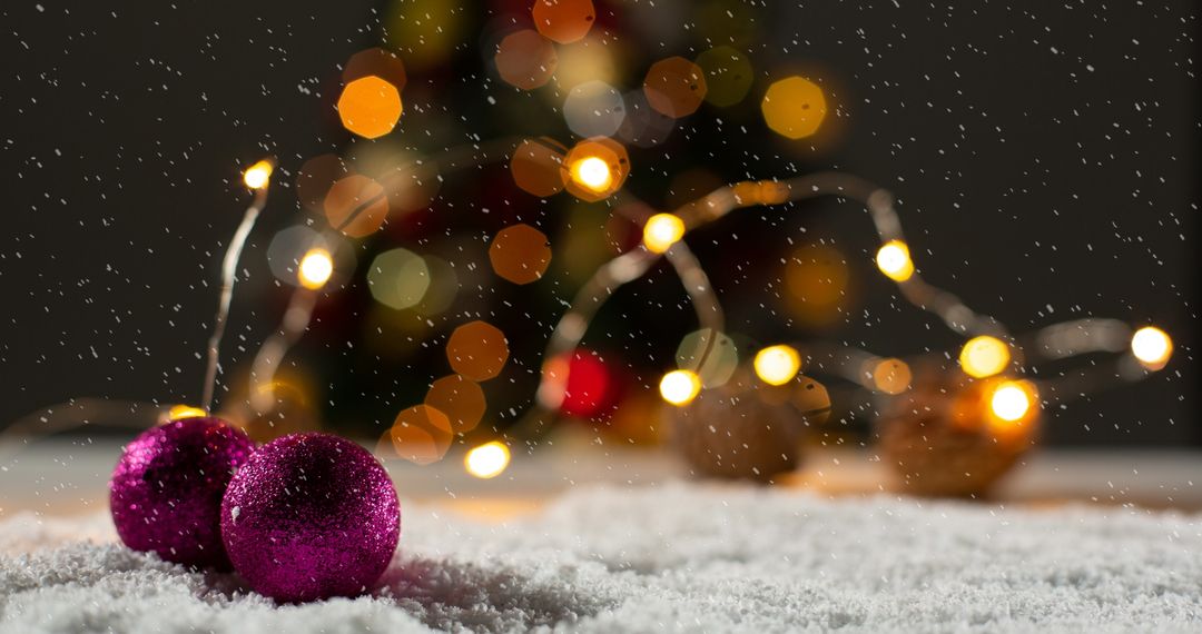 Festive Christmas Baubles with Falling Snow and Glowing Lights