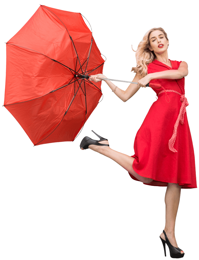 Elegant Blonde Holding Red Umbrella with Wind-Blown Pose