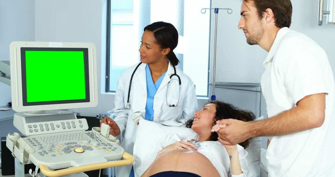 Pregnant Woman Getting Ultrasound Exam with Doctor and Partner - Free Images, Stock Photos and Pictures on Pikwizard.com