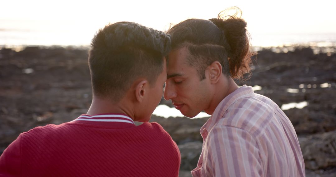 Close-up of Young LGBTQ Couple Showing Affection at Beach Sunset - Free Images, Stock Photos and Pictures on Pikwizard.com