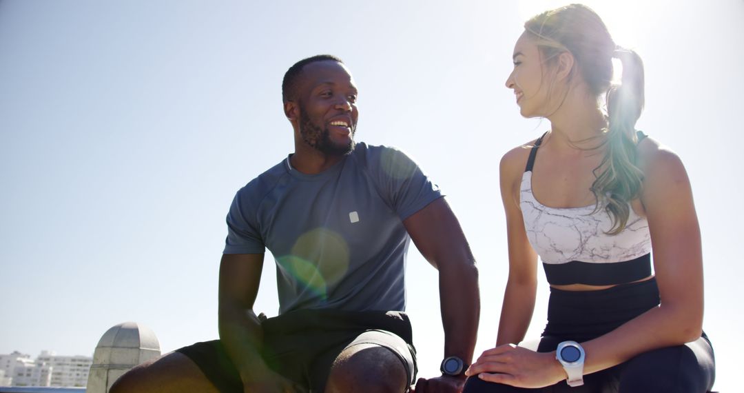 Fit Multiracial Couple Enjoying Outdoor Workout Together - Free Images, Stock Photos and Pictures on Pikwizard.com