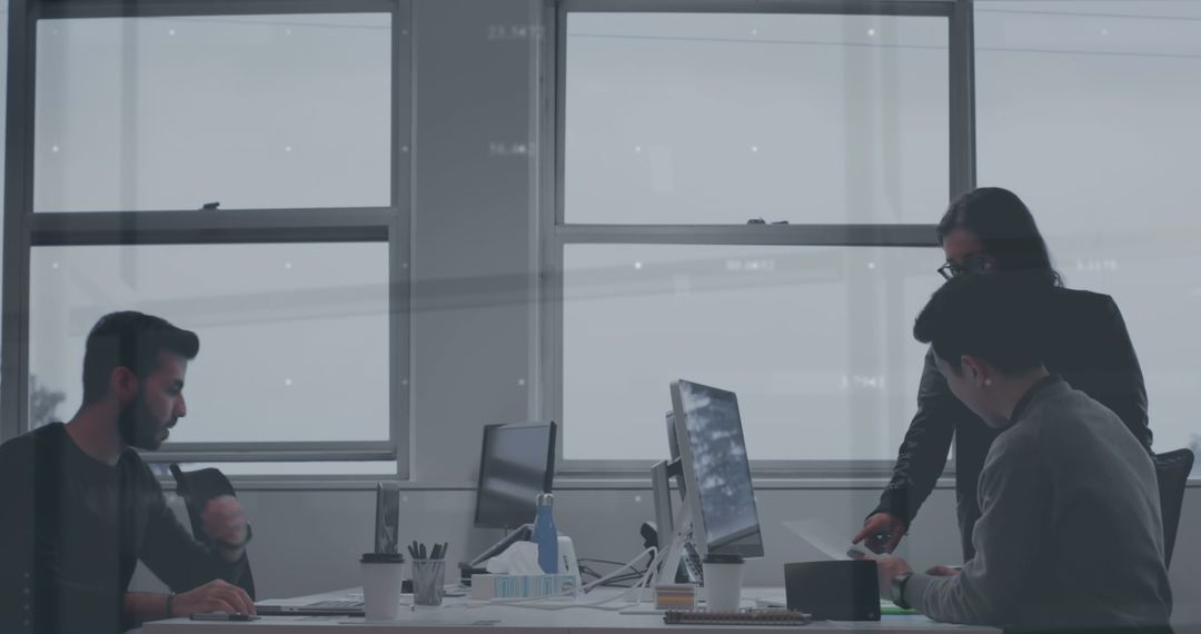 Business Executives Analyzing Financial Data in Modern Office