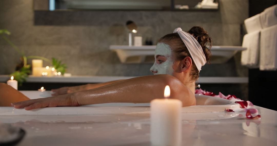 Woman Relaxing in Spa Bath with Candlelight and Face Mask - Free Images, Stock Photos and Pictures on Pikwizard.com