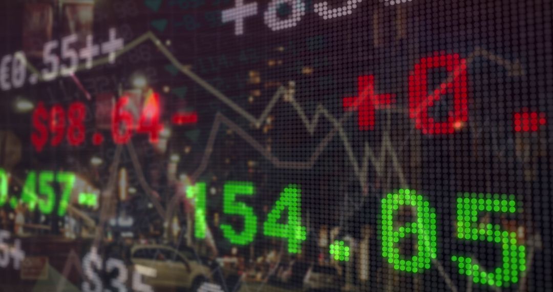 Digital Stock Market Display Over Urban Cityscape at Night
