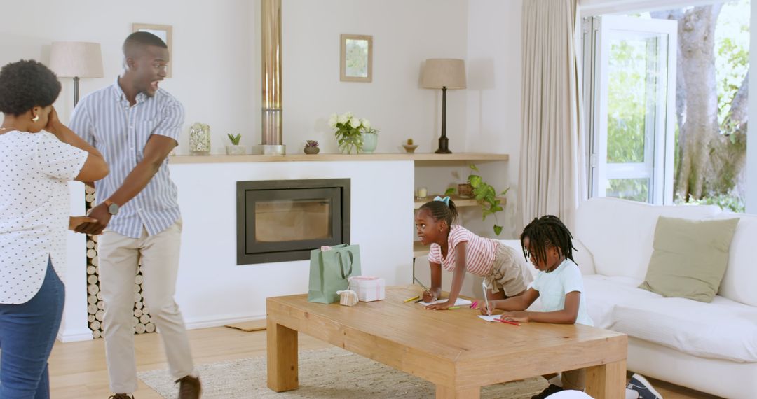 Happy Family Enjoying Creative Afternoon with Crafts at Home