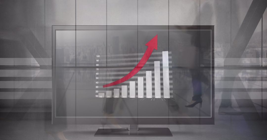 Business Growth Chart on Computer Screen Amidst Busy Office Environment