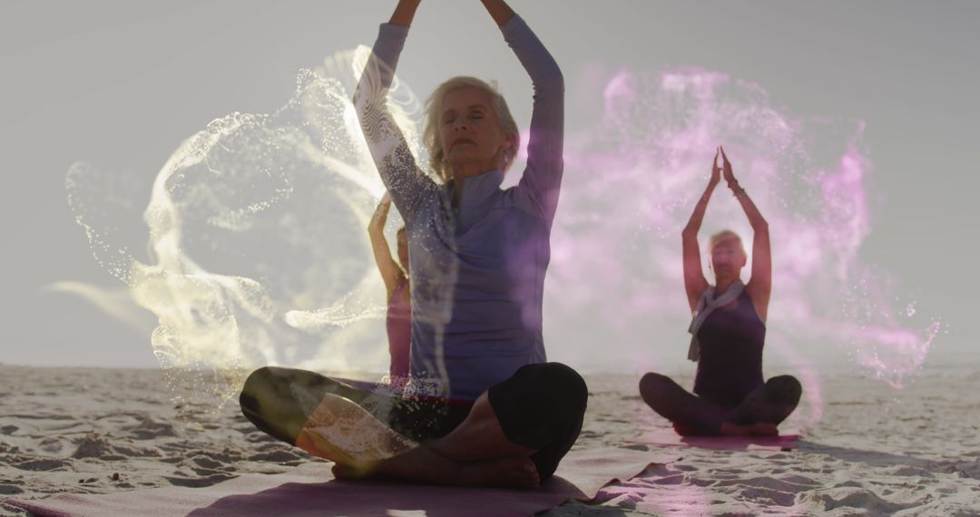 Group of Seniors Practicing Yoga on Beach