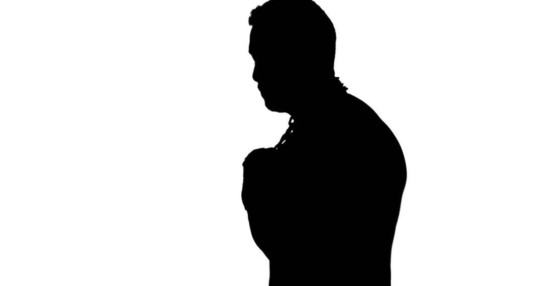 Silhouette of Contemplative Man in Profile