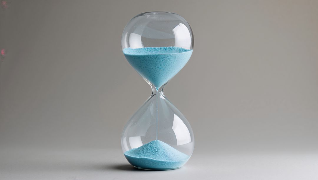 Elegantly Designed Hourglass with Tranquil Blue Sand on Display