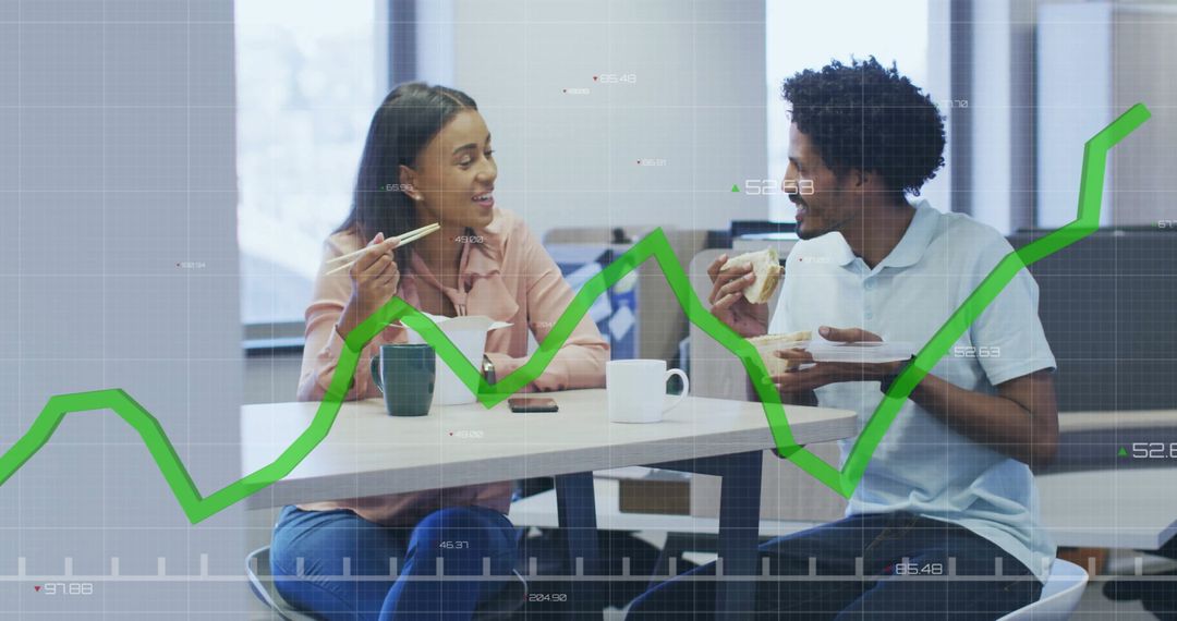 Colleagues Sharing Lunch with Superimposed Data Graph
