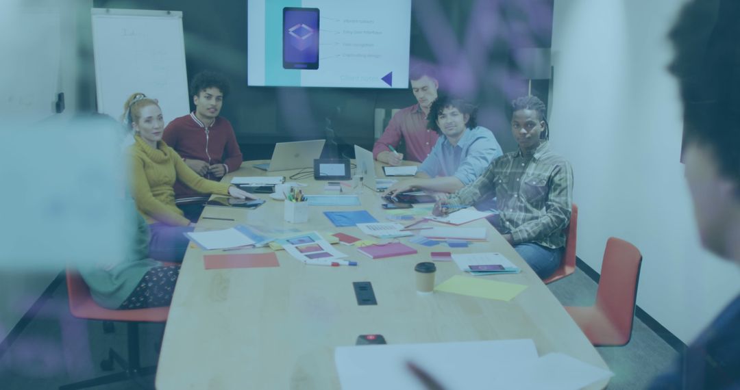 Diverse Team Collaborating Around Conference Table with Data Overlay